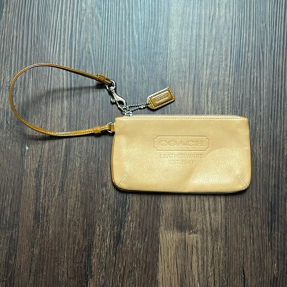 Camel/tan coach wristlet